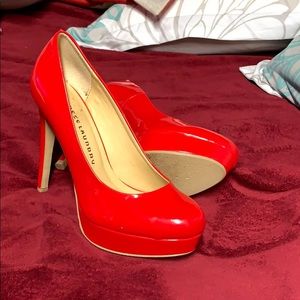 Red heels on worn once